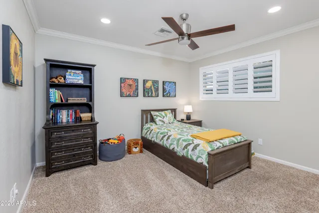 a view of a workspace with furniture