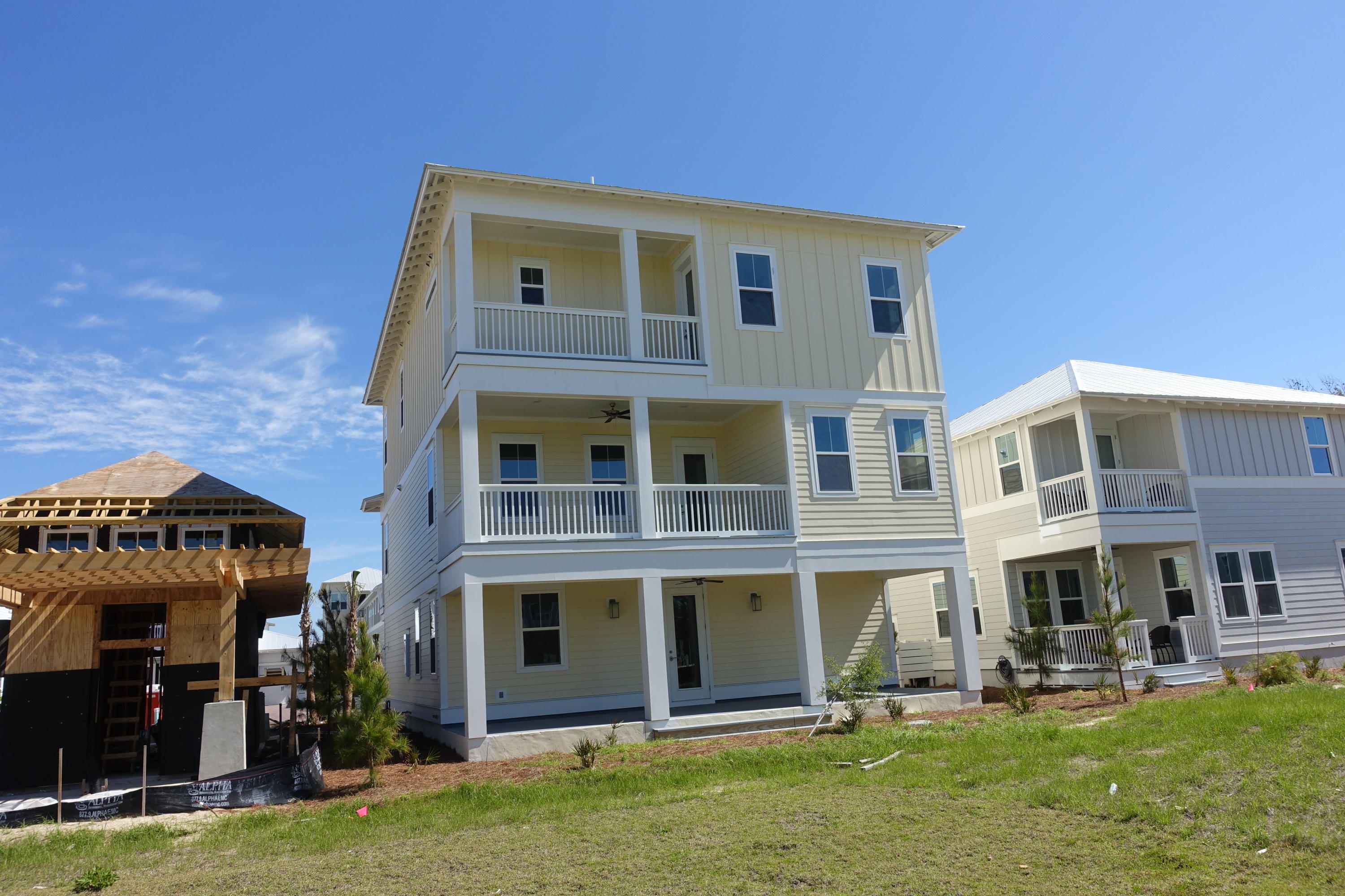 28 East Crabbing Hole Ln Inlet Beach Inlet Beach, FL 32461 - Photo 36 of 56 a front view of a building with a yard