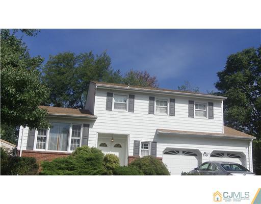 10 Eagle Road Edison, NJ 08820 - Photo 1 of 12 a black and white photo of a house