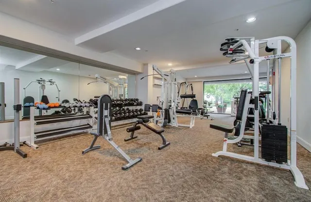 a view of a room with gym equipment
