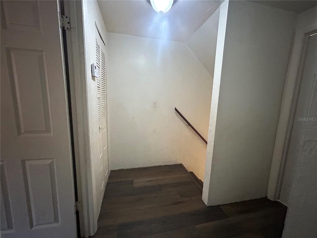 707 Southwest 68th Terrace, Unit A Gainesville, FL 32607 - Photo 12 of 16 a view of entryway with wooden floor