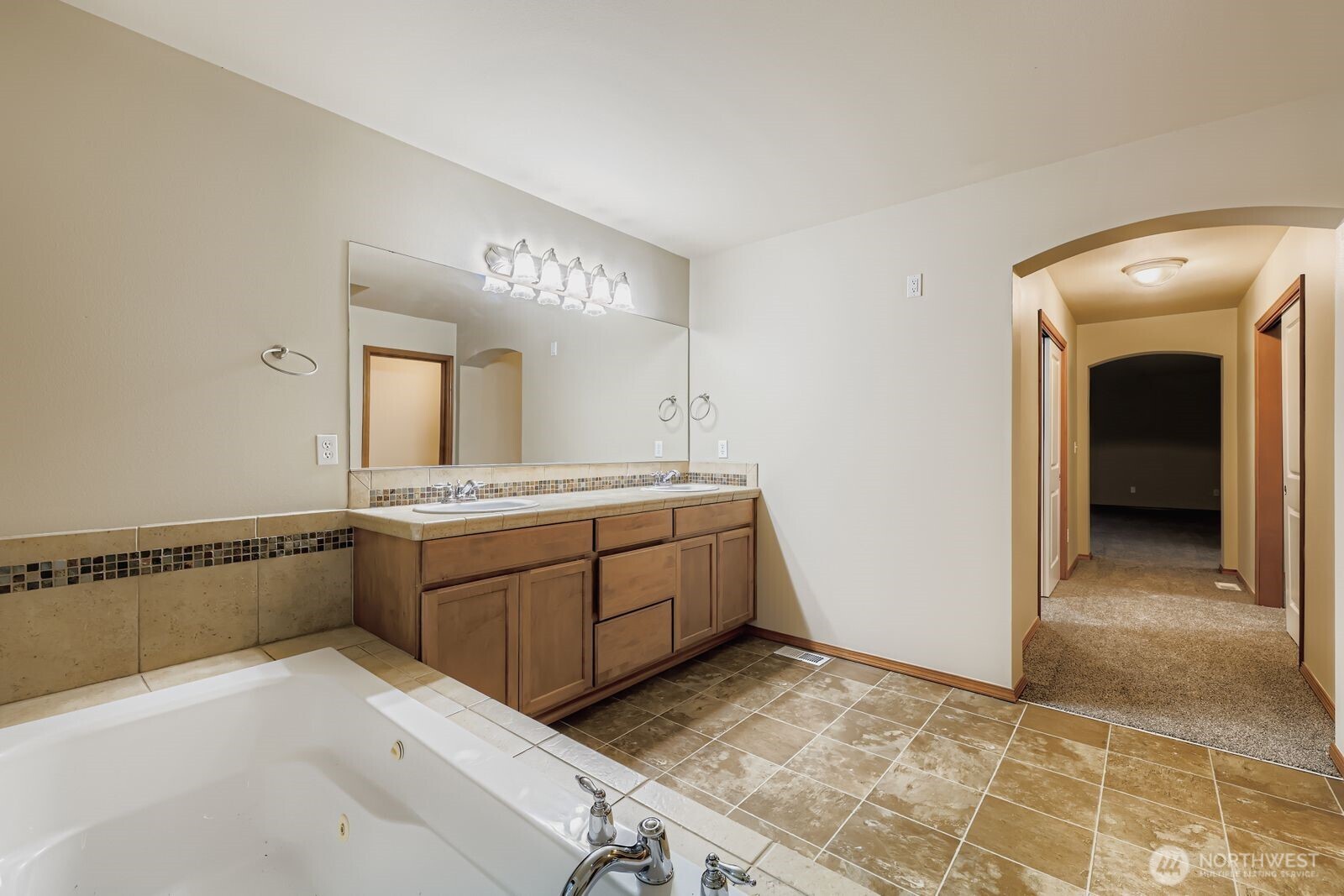 16305 37th Drive Southeast Bothell, WA 98012 - Photo 19 of 34 a room with a sink and a mirror