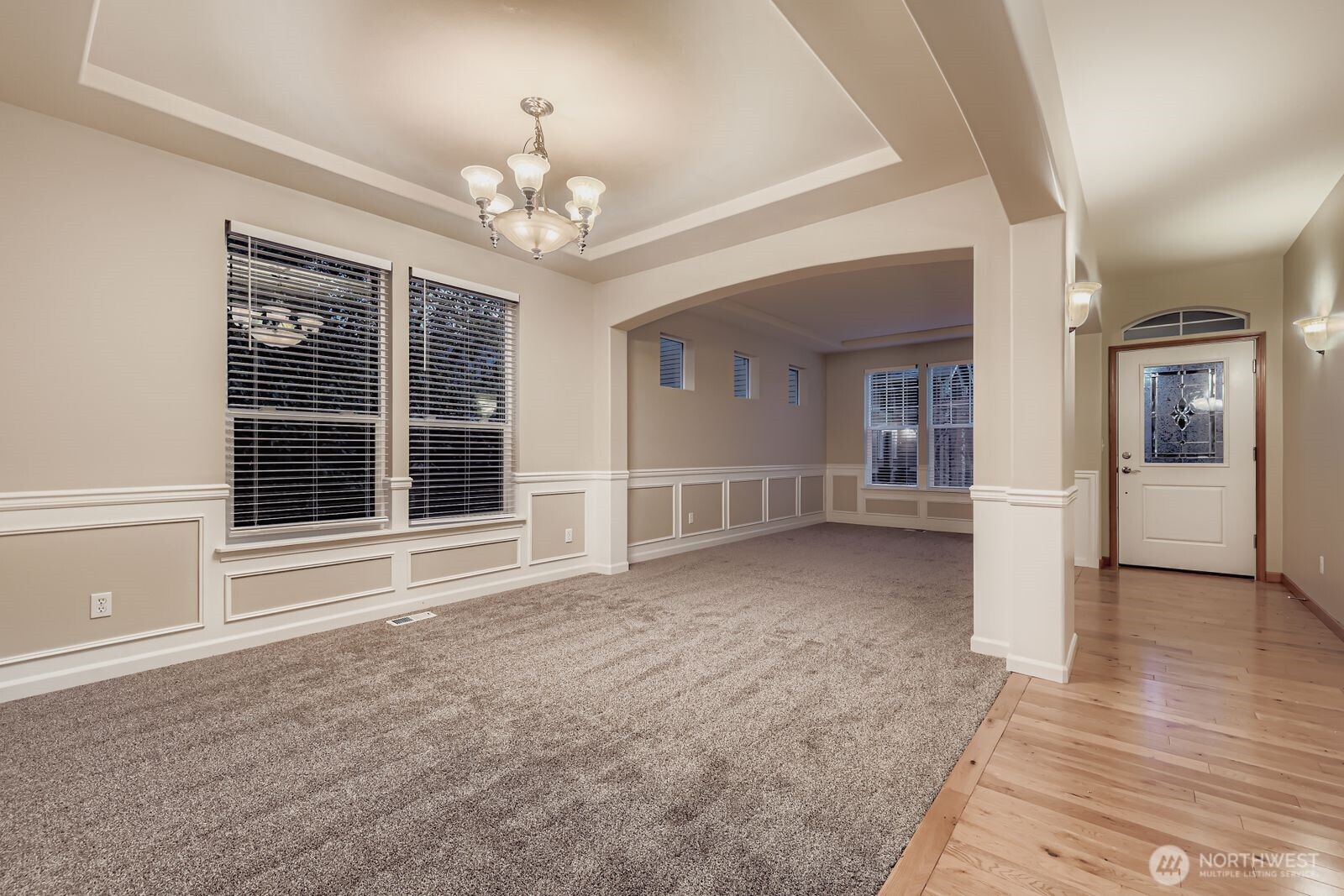 16305 37th Drive Southeast Bothell, WA 98012 - Photo 2 of 34 a view of an empty room with a window and a kitchen