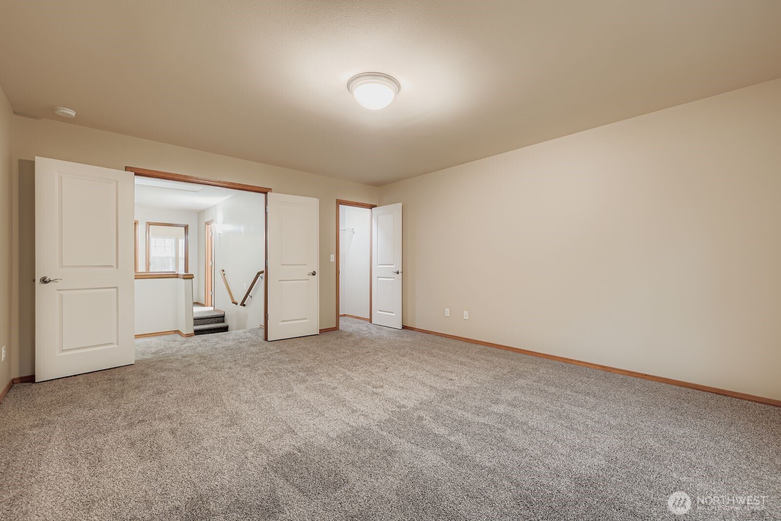 16305 37th Drive Southeast Bothell, WA 98012 - Photo 21 of 34 an empty room with windows