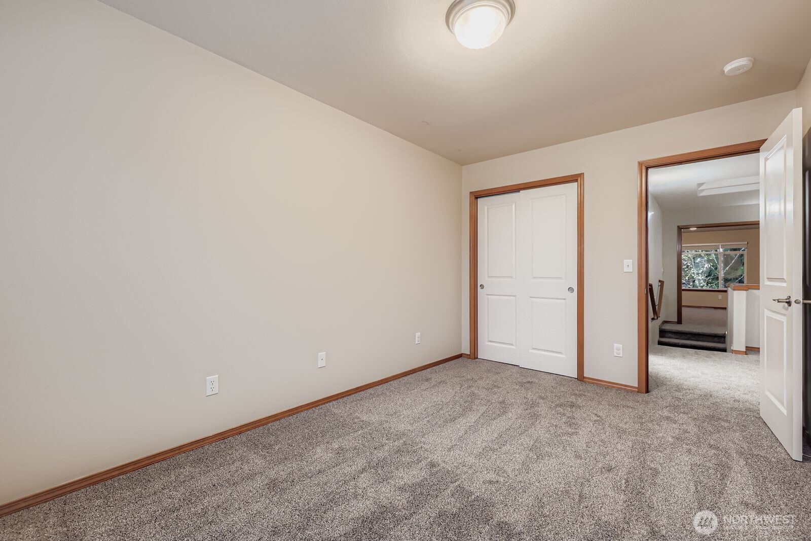 16305 37th Drive Southeast Bothell, WA 98012 - Photo 22 of 34 an empty room with mirror