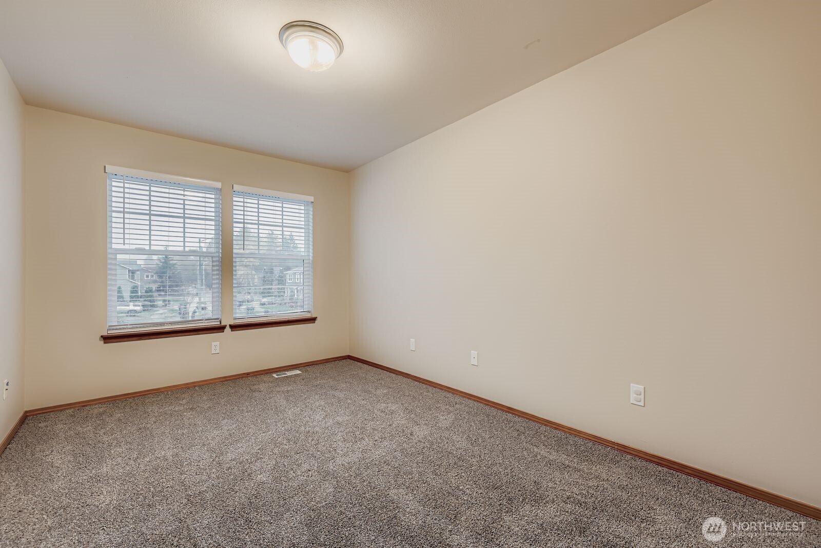 16305 37th Drive Southeast Bothell, WA 98012 - Photo 23 of 34 an empty room with windows