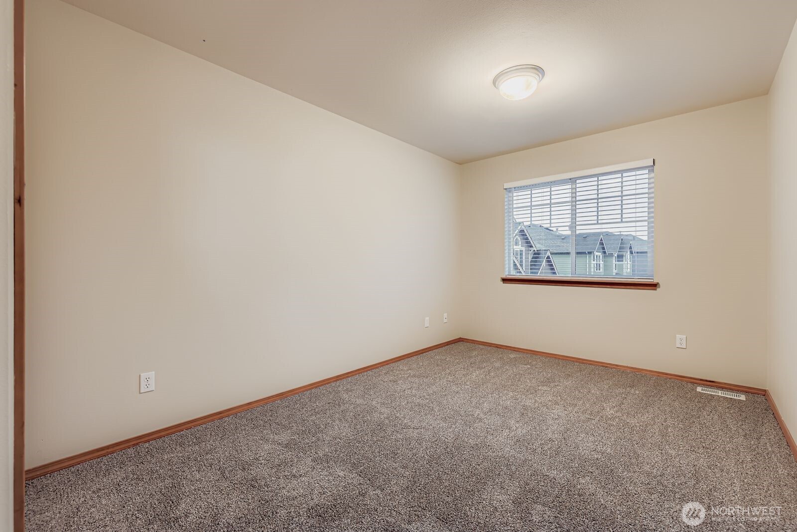 16305 37th Drive Southeast Bothell, WA 98012 - Photo 24 of 34 an empty room with a empty space and windows