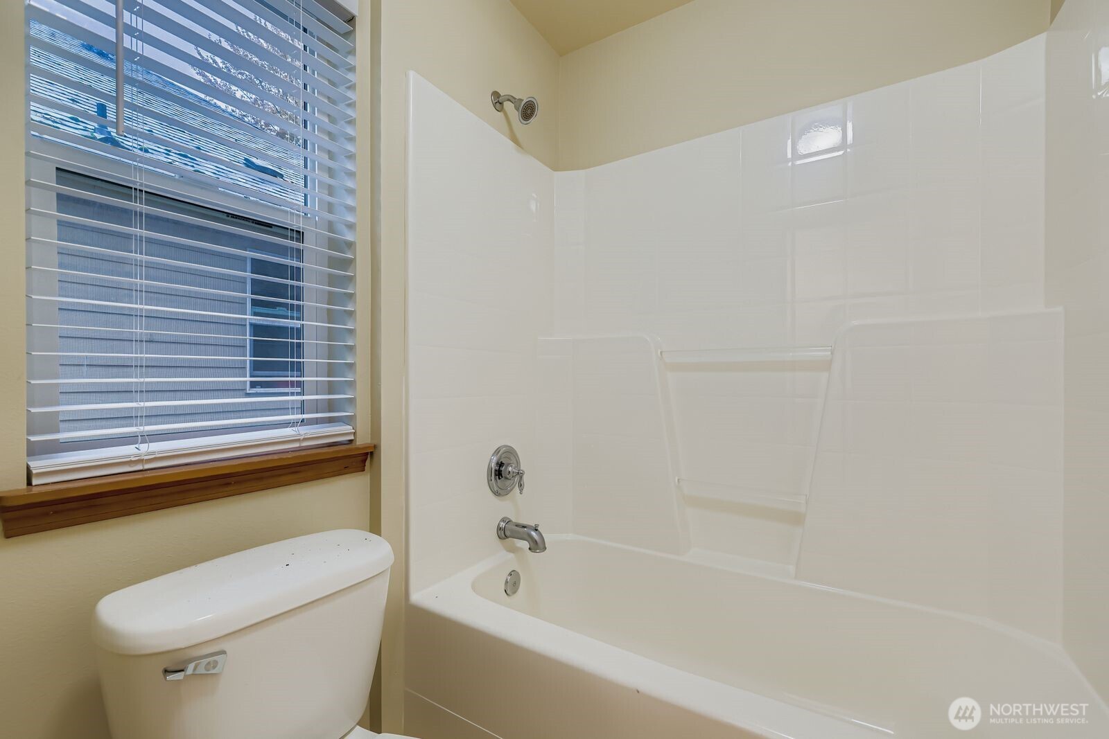 16305 37th Drive Southeast Bothell, WA 98012 - Photo 27 of 34 a bathroom with a toilet and a bathtub