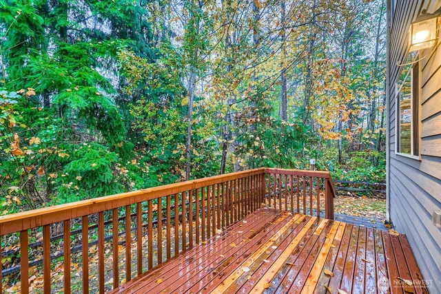 a view of balcony with wooden floor