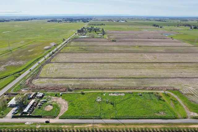 a view of swimming pool with a balcony