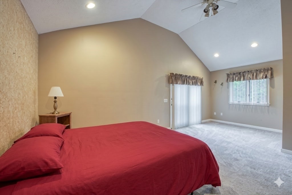 7 Tisdale Road Sharon, MA 02067 - Photo 15 of 37 a bed room with a bed and a chair