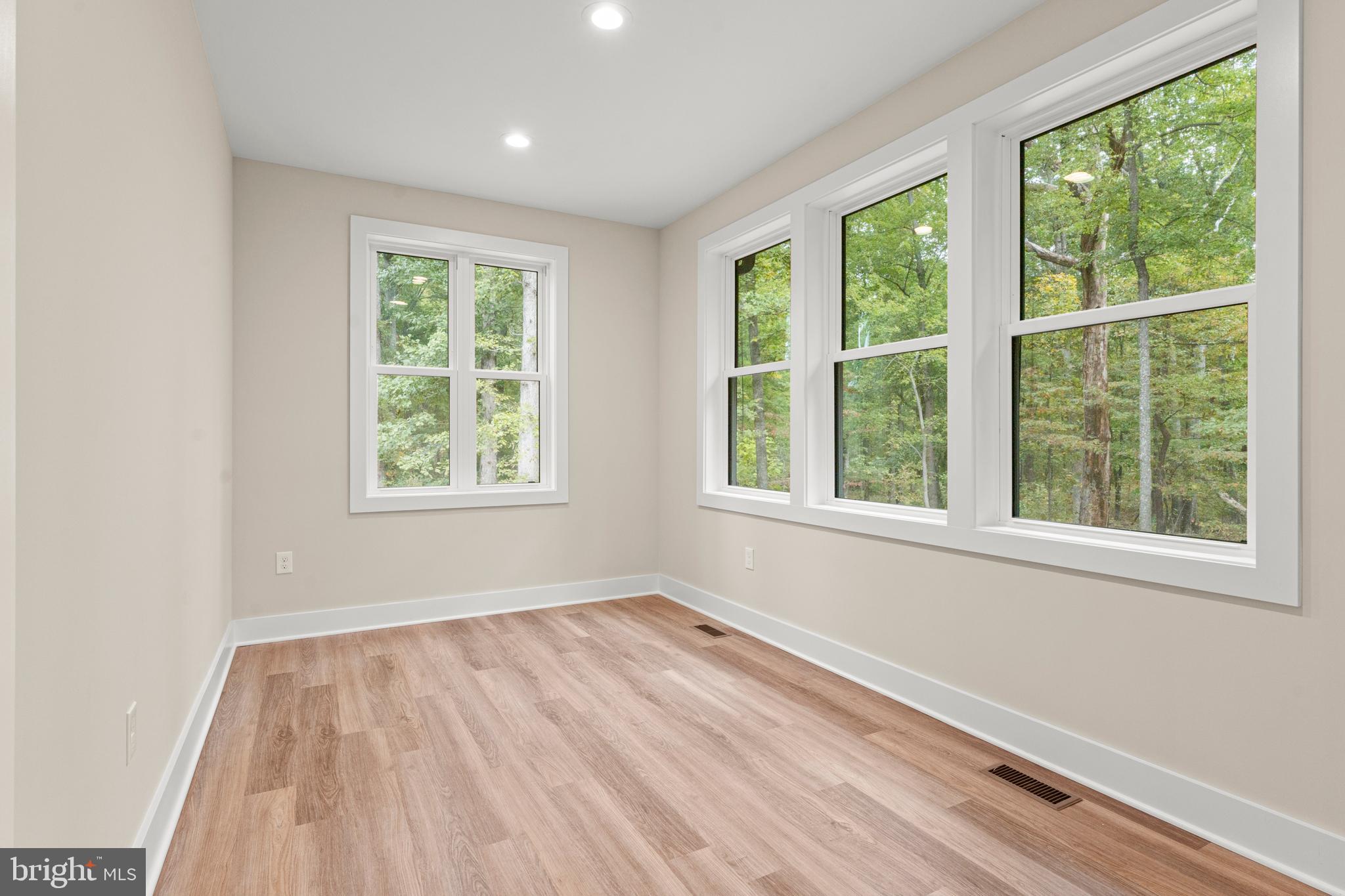 5725 Turner Road Broad Run, VA 20137 - Photo 23 of 57 an empty room with wooden floor and windows