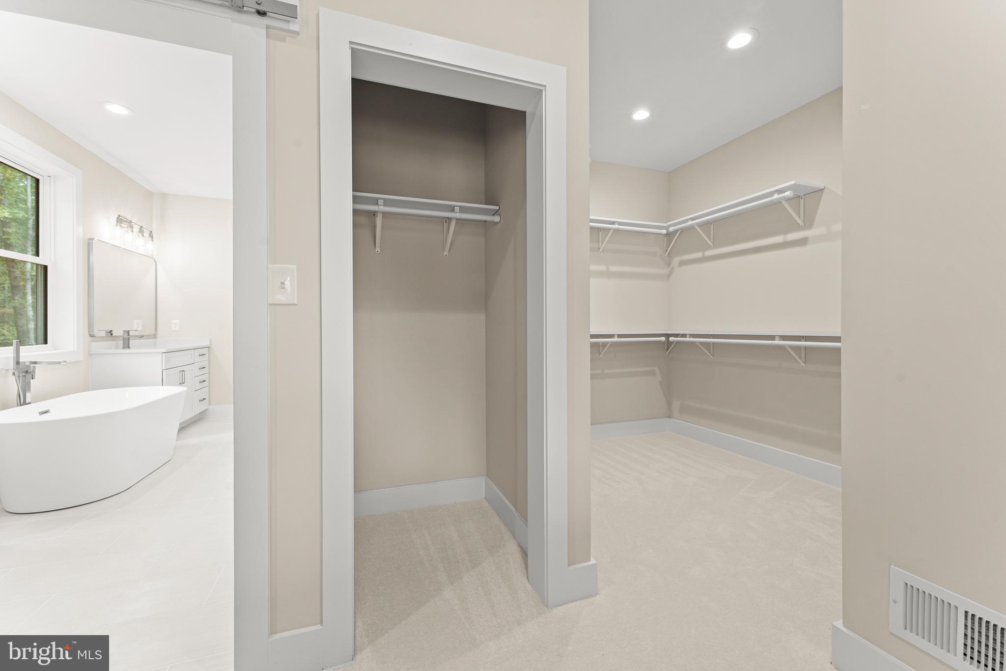 5725 Turner Road Broad Run, VA 20137 - Photo 30 of 57 a bathroom with a bathtub and a sink