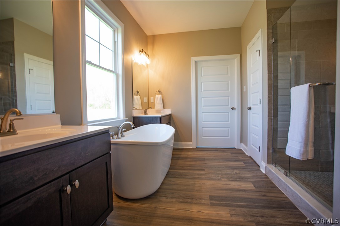 460 Jamestown Road Farmville, VA 23901 - Photo 27 of 50 a bathroom with a granite countertop sink toilet a mirror and a tub