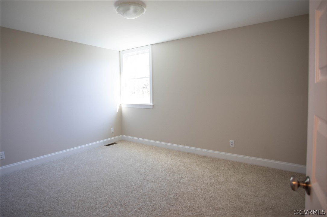460 Jamestown Road Farmville, VA 23901 - Photo 31 of 50 an empty room with a window
