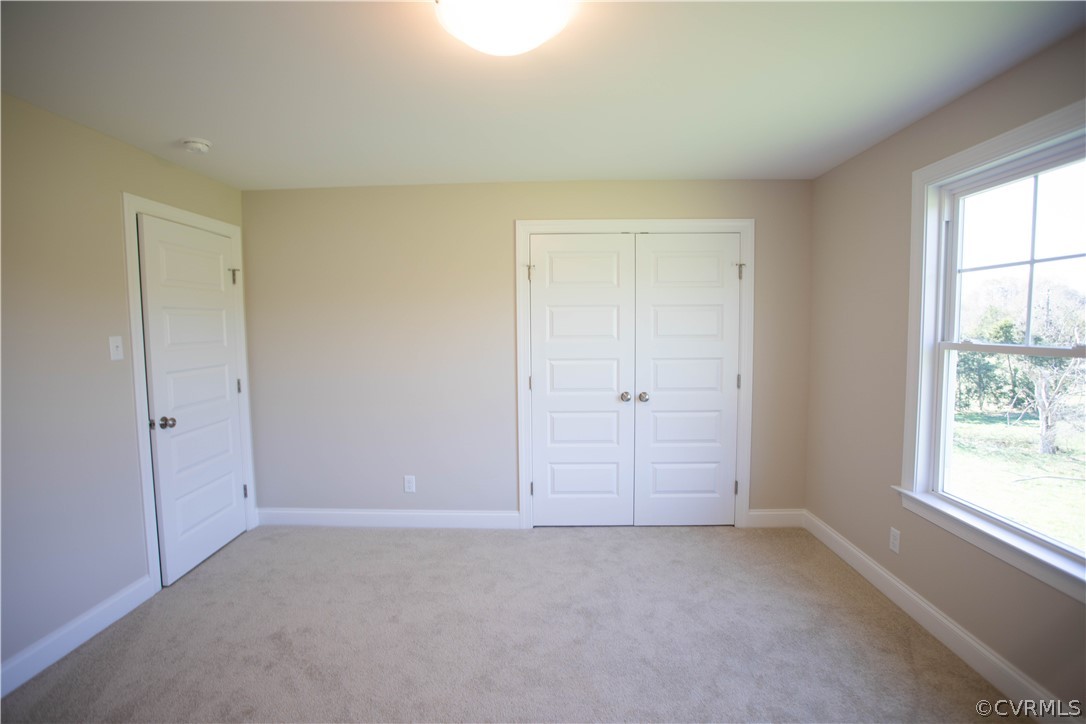 460 Jamestown Road Farmville, VA 23901 - Photo 34 of 50 an empty room with windows and closet