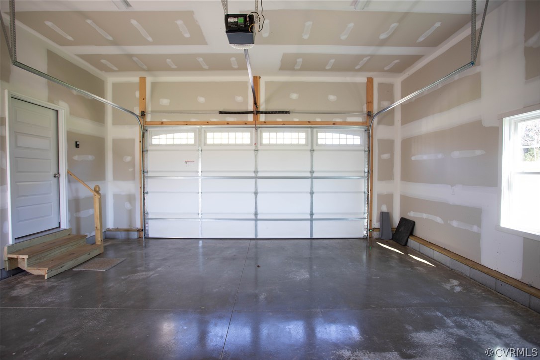 460 Jamestown Road Farmville, VA 23901 - Photo 36 of 50 an empty room with wooden floor and windows