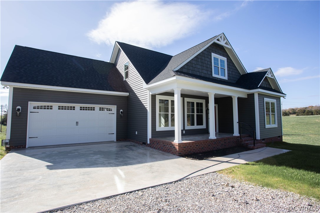 460 Jamestown Road Farmville, VA 23901 - Photo 5 of 50 a front view of a house with a yard and garage