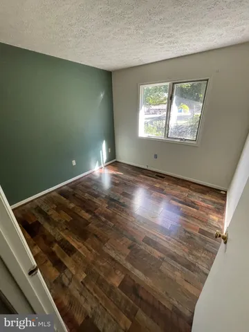 a kitchen with stainless steel appliances granite countertop a refrigerator stove a sink and dishwasher