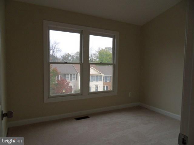 43441 Postrail Square Ashburn, VA 20147 - Photo 19 of 24 an empty room with a window