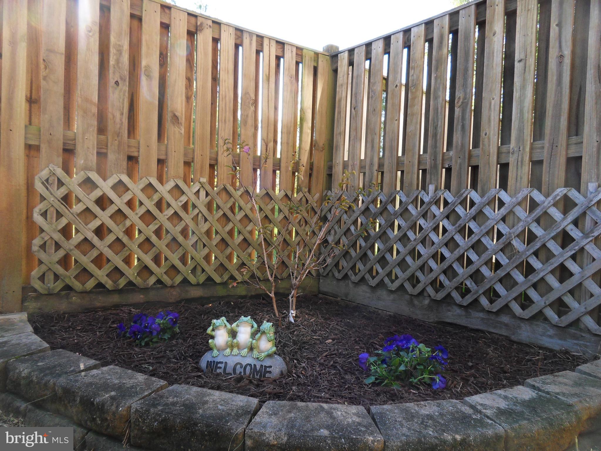 43441 Postrail Square Ashburn, VA 20147 - Photo 22 of 24 a view of a wooden fence
