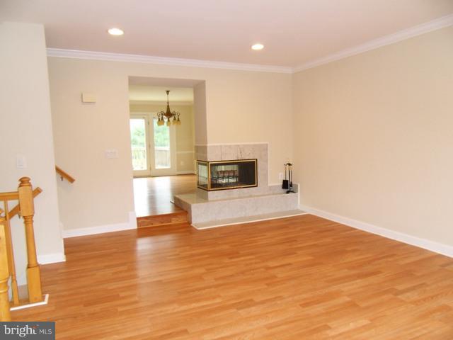 43441 Postrail Square Ashburn, VA 20147 - Photo 3 of 24 a view of empty room with wooden floor