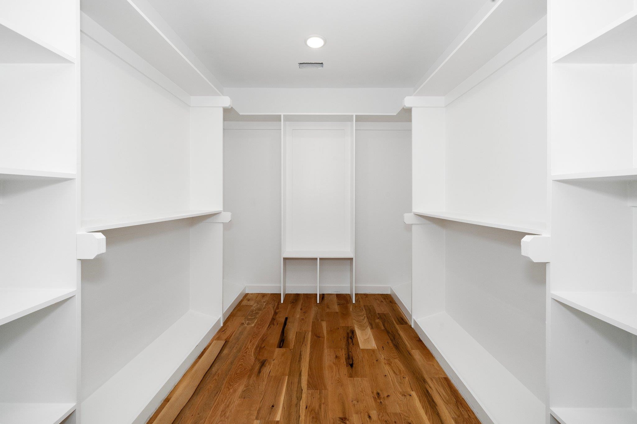 2300 Kilburn Road Raleigh, NC 27604 - Photo 20 of 42 a view of a room with wooden floor and cabinets