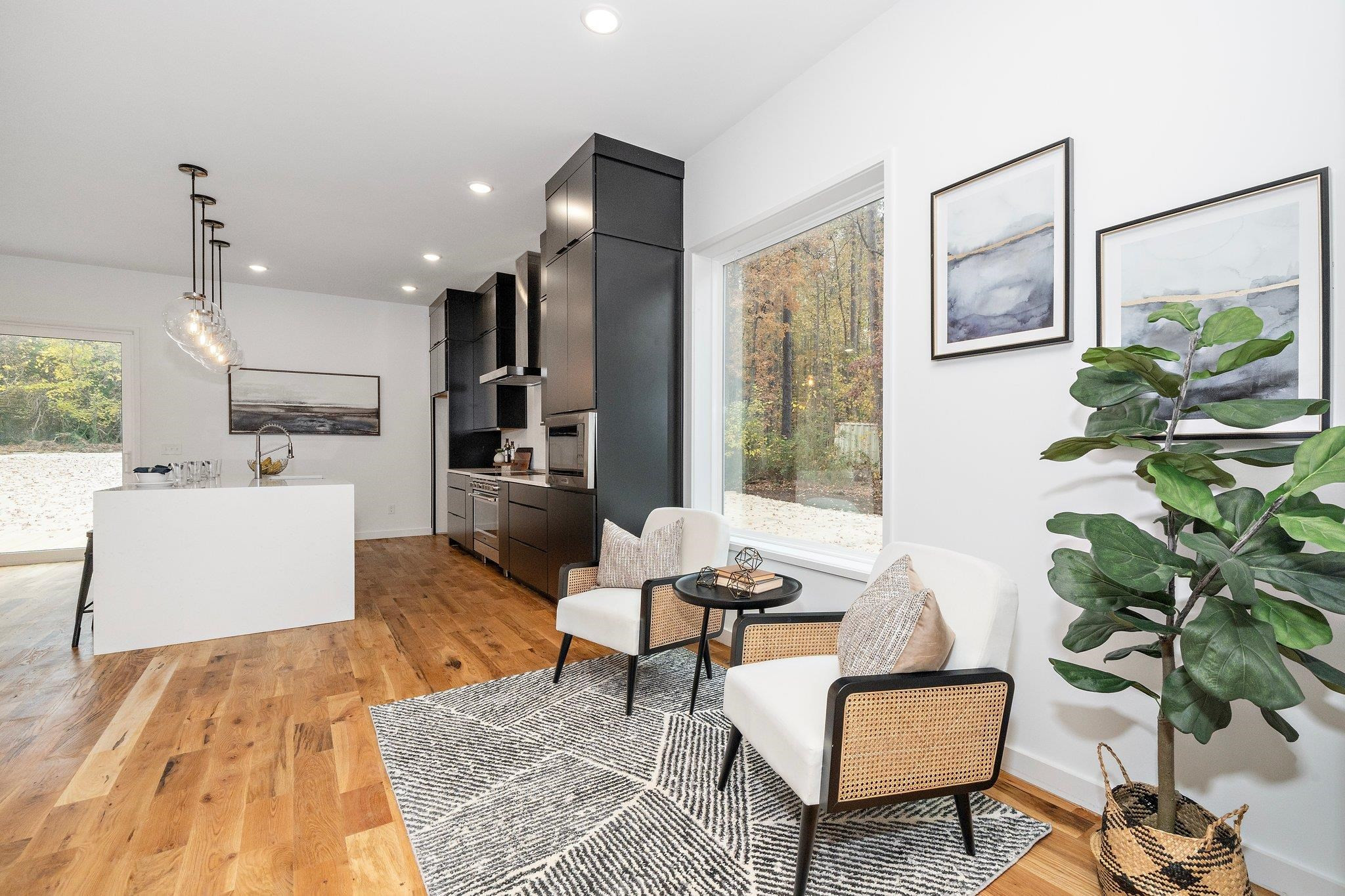 2300 Kilburn Road Raleigh, NC 27604 - Photo 2 of 42 a living room with furniture and a potted plant