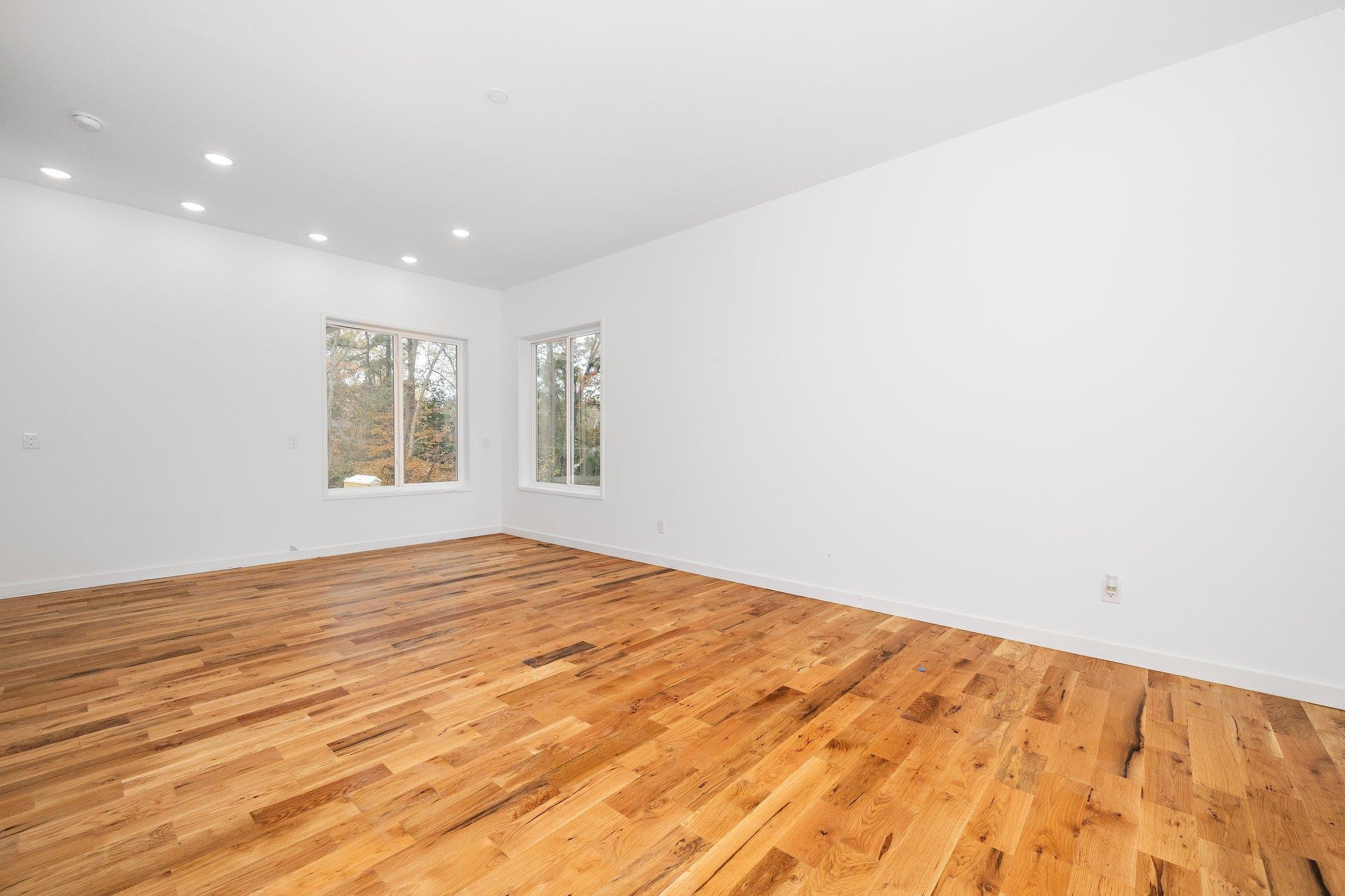 2300 Kilburn Road Raleigh, NC 27604 - Photo 28 of 42 a view of empty room with wooden floor and fan