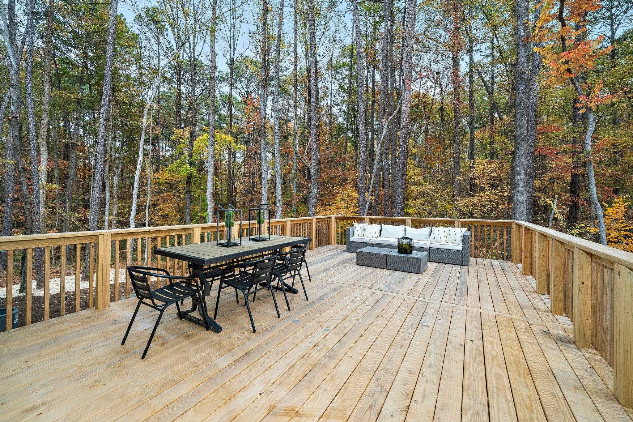 2300 Kilburn Road Raleigh, NC 27604 - Photo 30 of 42 a view of balcony with wooden floor and outdoor seating