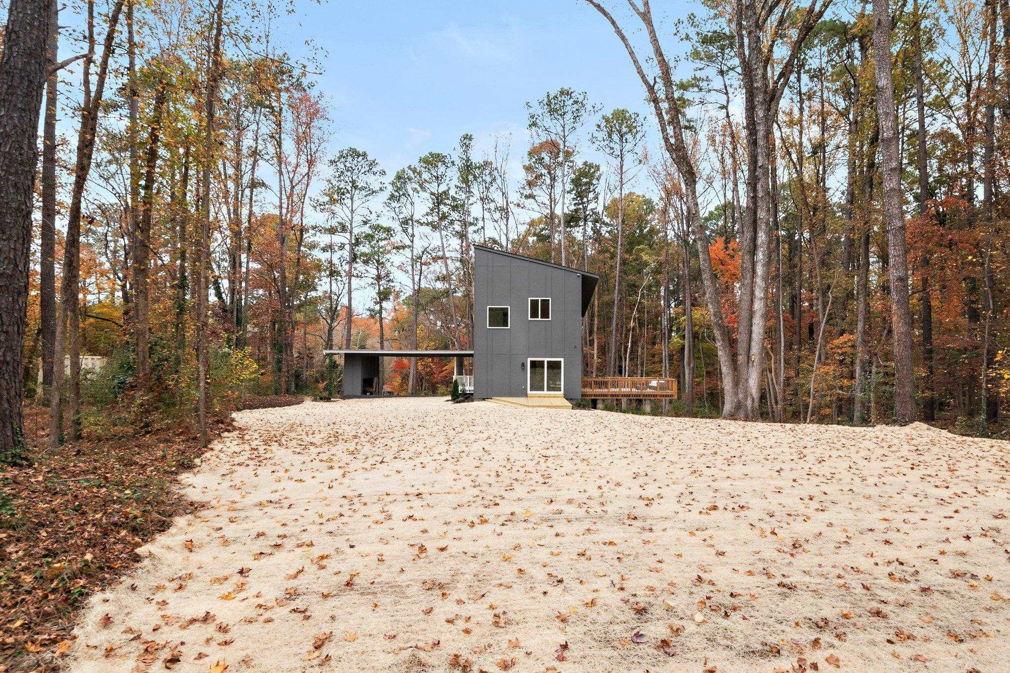2300 Kilburn Road Raleigh, NC 27604 - Photo 36 of 42 a house with trees in front of it