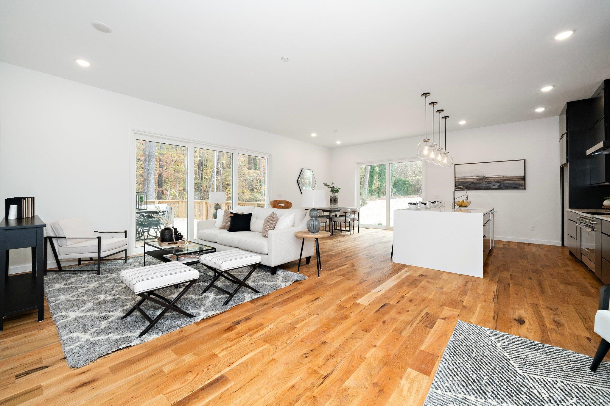 2300 Kilburn Road Raleigh, NC 27604 - Photo 8 of 42 a living room with furniture and a wooden floor