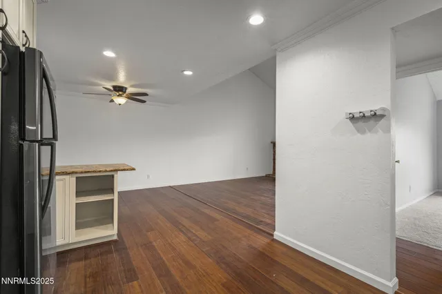 a view of a livingroom with wooden floor