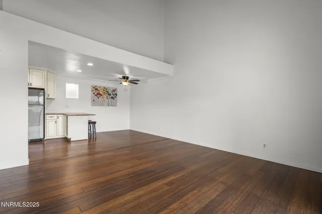 a view of a kitchen with a sink and a kitchen view