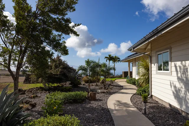 a view of swimming pool with outdoor seating and yard