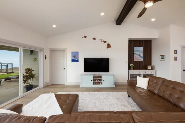 a bathroom with a double vanity sink a toilet and a mirror