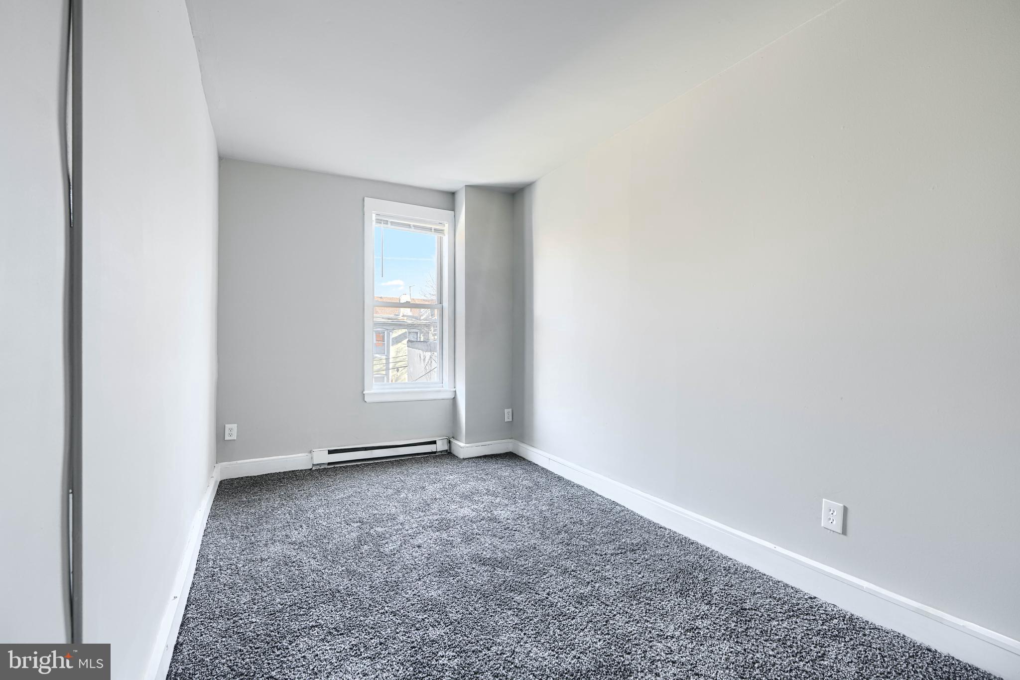 617 North Paca Street Baltimore, MD 21201 - Photo 15 of 20 a view of an empty room with a window