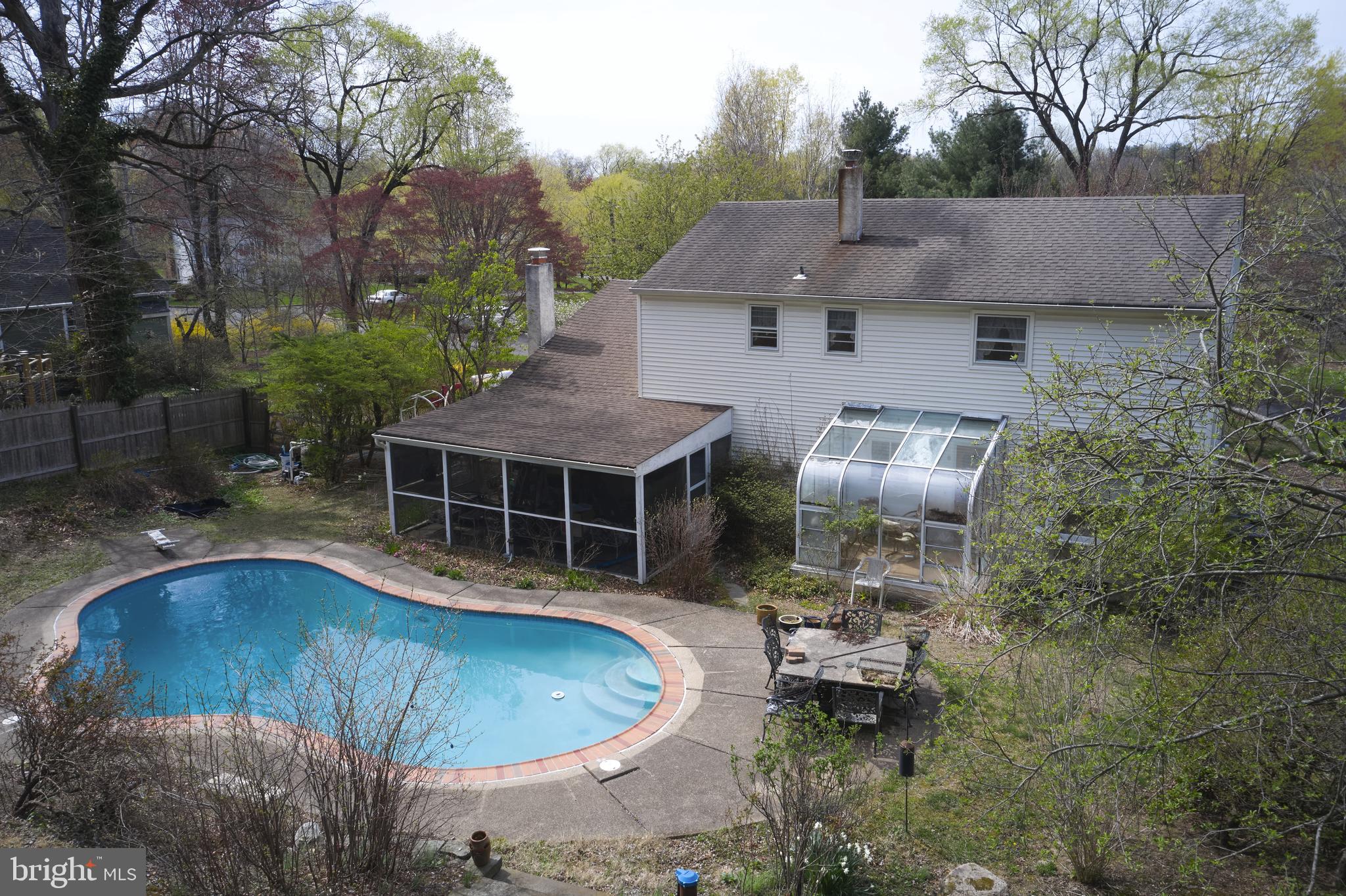2203 Turk Road Doylestown, PA 18901 - Photo 2 of 8 an aerial view of a house with swimming pool and porch