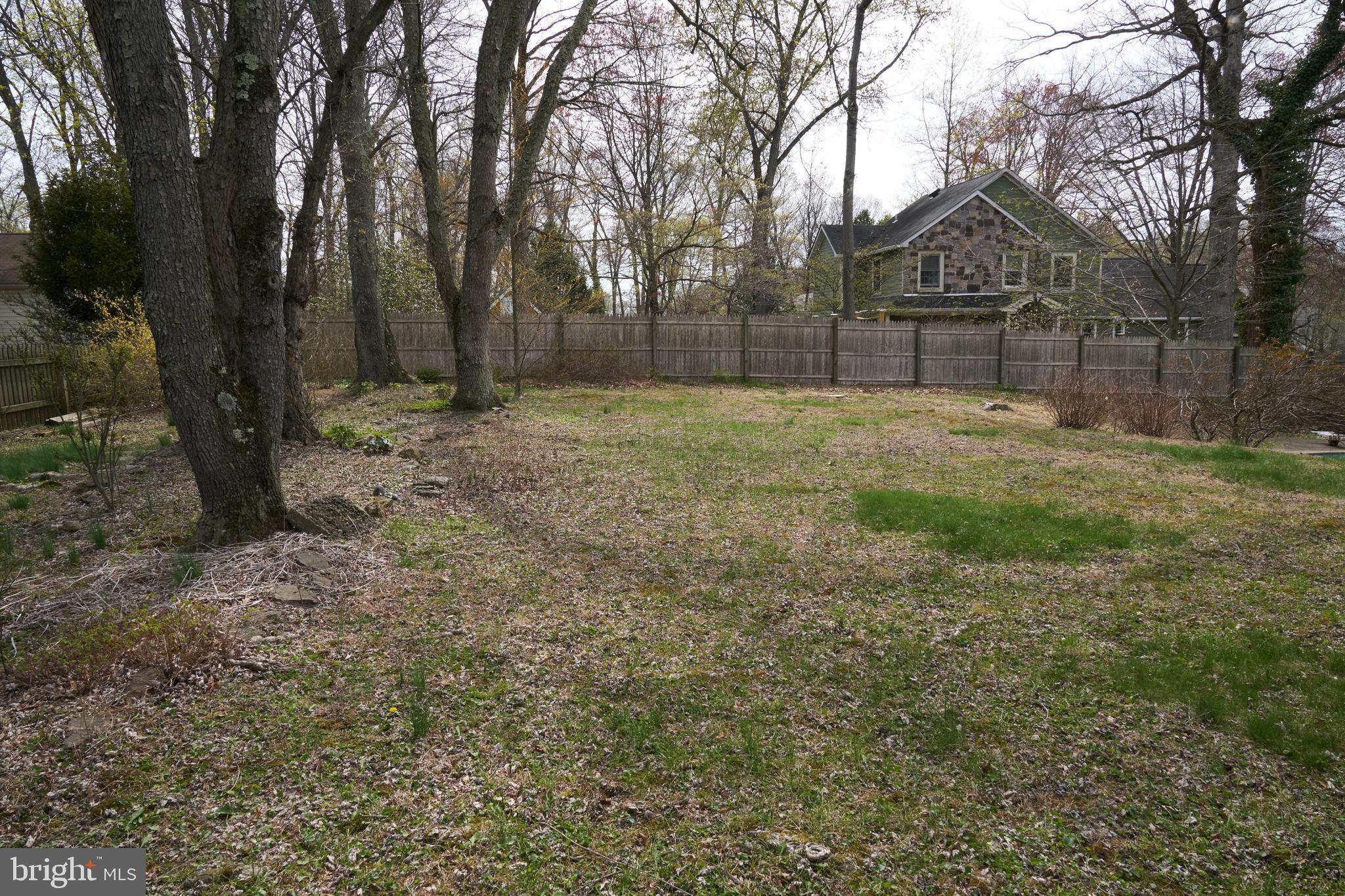 2203 Turk Road Doylestown, PA 18901 - Photo 4 of 8 a backyard of a house with lots of green space