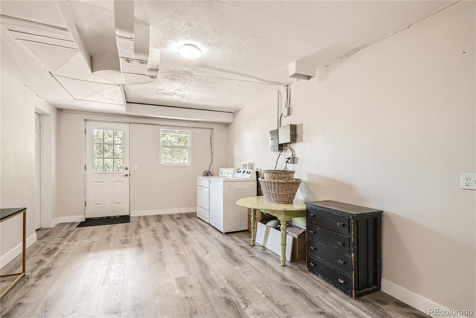1209 West Ridge Road Littleton, CO 80120 - Photo 25 of 33 a workspace with furniture and window