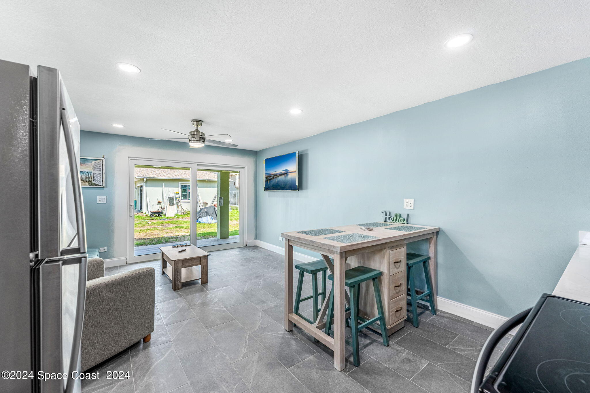 2189 Pineapple Avenue, Unit C Melbourne, FL 32935 - Photo 13 of 67 a view of a livingroom with furniture window and outside view