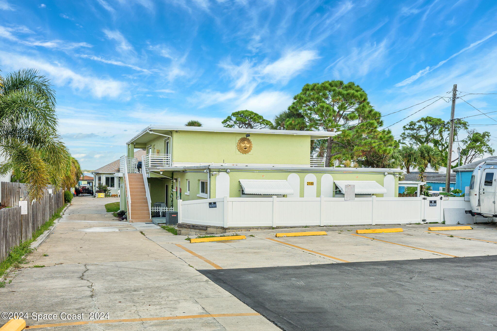 2189 Pineapple Avenue, Unit C Melbourne, FL 32935 - Photo 32 of 67 a view of a building with a road