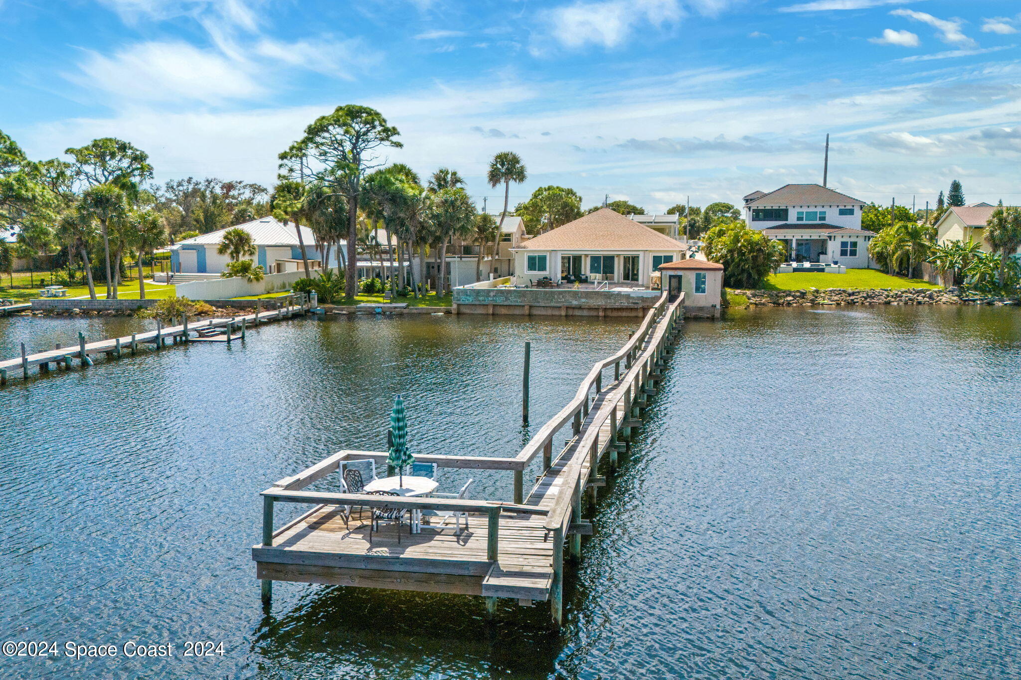 2189 Pineapple Avenue, Unit C Melbourne, FL 32935 - Photo 40 of 67 a view of a lake with sitting area