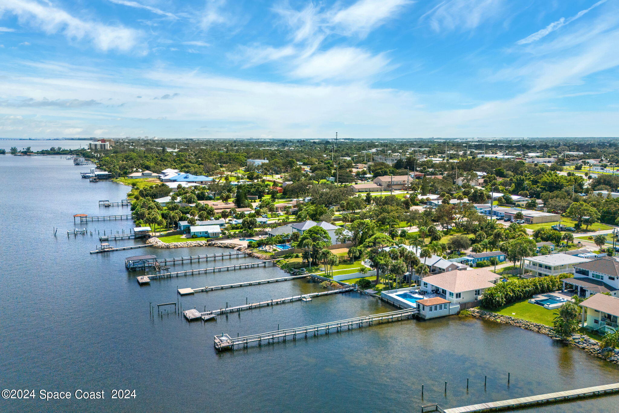 2189 Pineapple Avenue, Unit C Melbourne, FL 32935 - Photo 43 of 67 an aerial view of residential houses with outdoor space