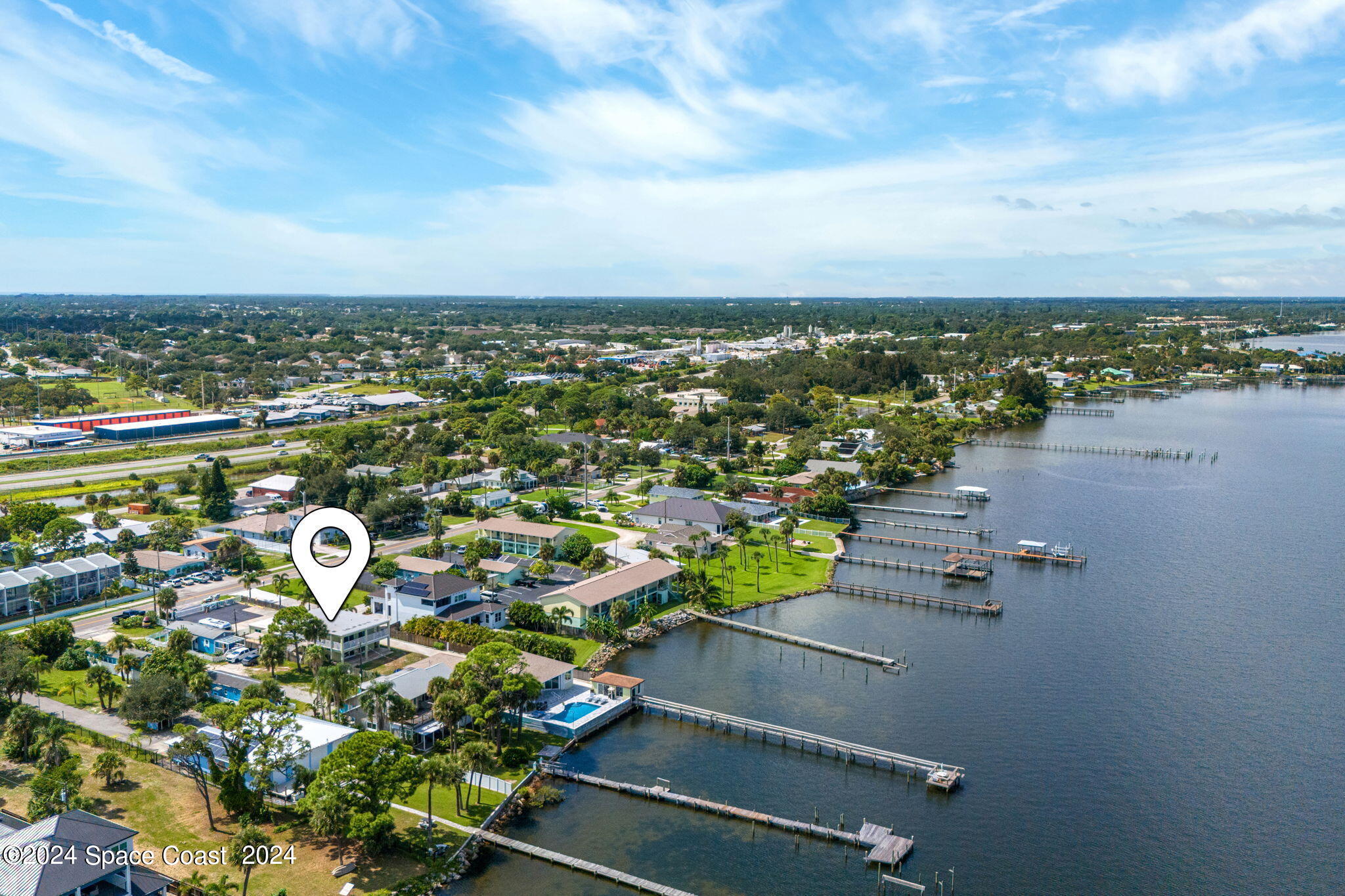 2189 Pineapple Avenue, Unit C Melbourne, FL 32935 - Photo 44 of 67 an aerial view of multiple house with yard