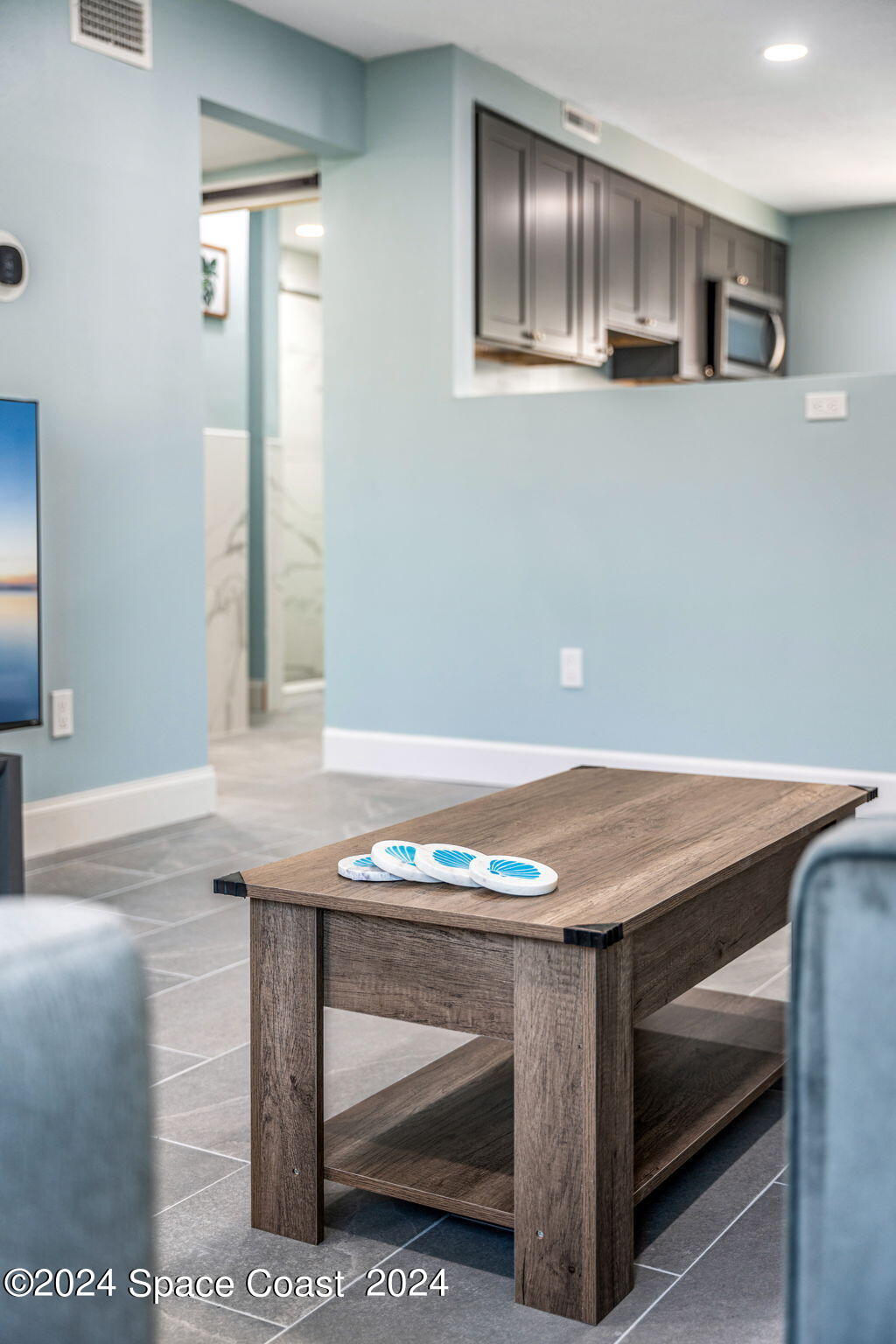 2189 Pineapple Avenue, Unit C Melbourne, FL 32935 - Photo 56 of 67 a room with table and window