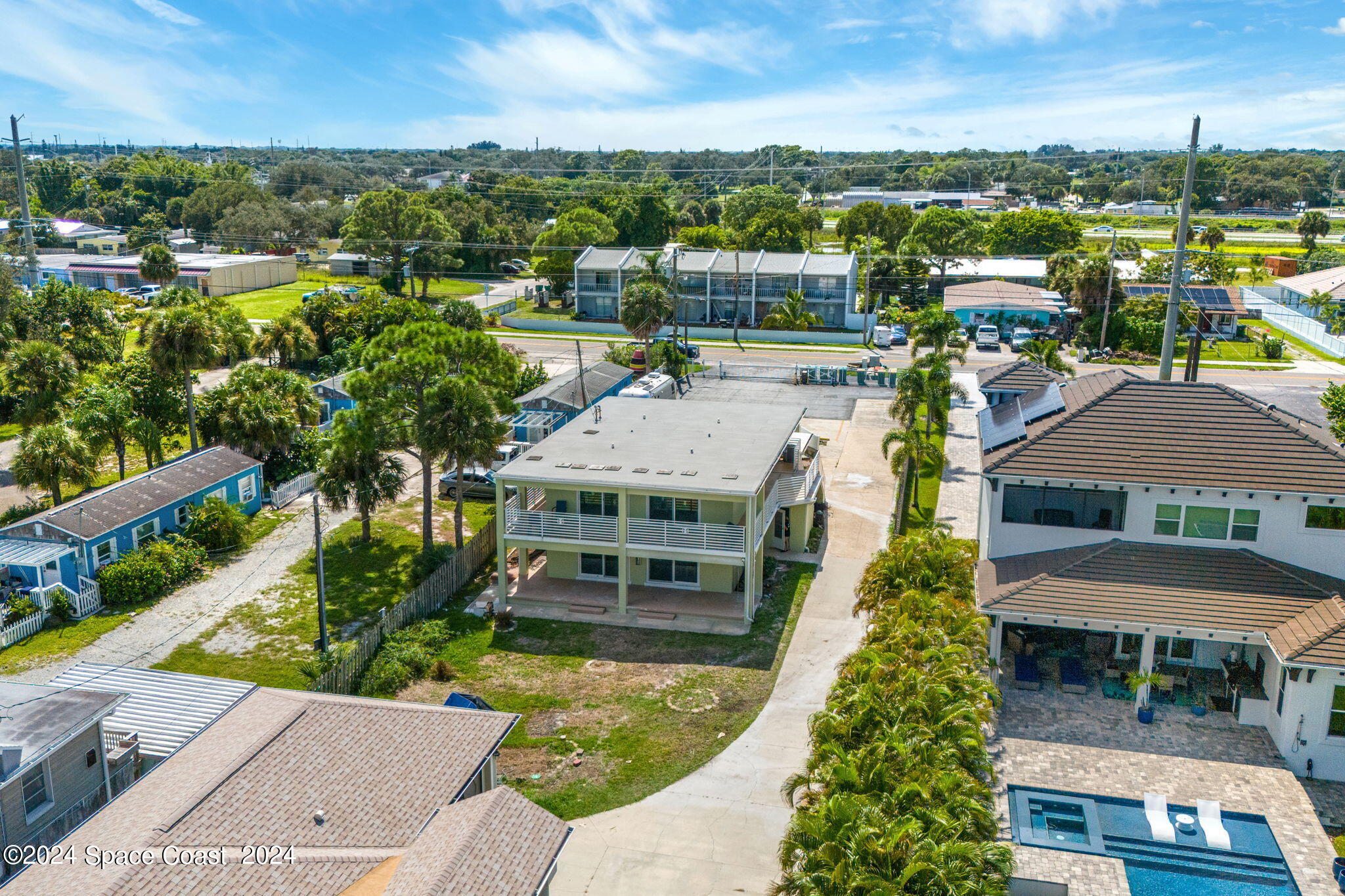 2189 Pineapple Avenue, Unit C Melbourne, FL 32935 - Photo 8 of 67 a view of a city with tall buildings
