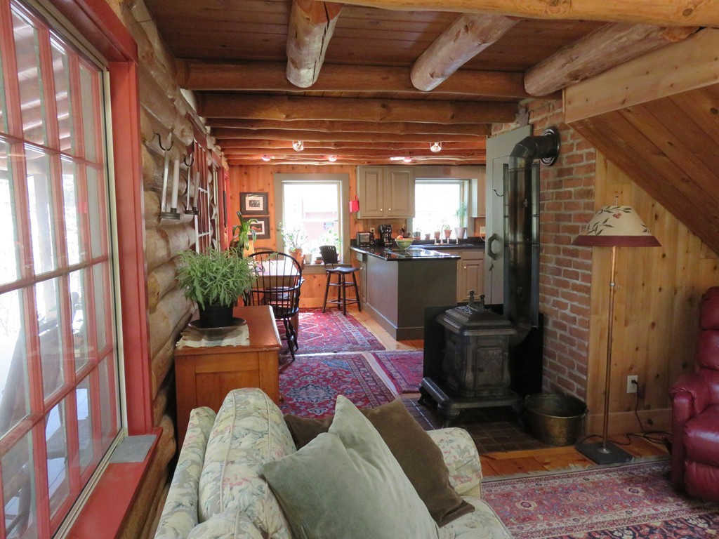 205 Linseed Road Hatfield, MA 01088 - Photo 14 of 30 a living room with furniture and a potted plant