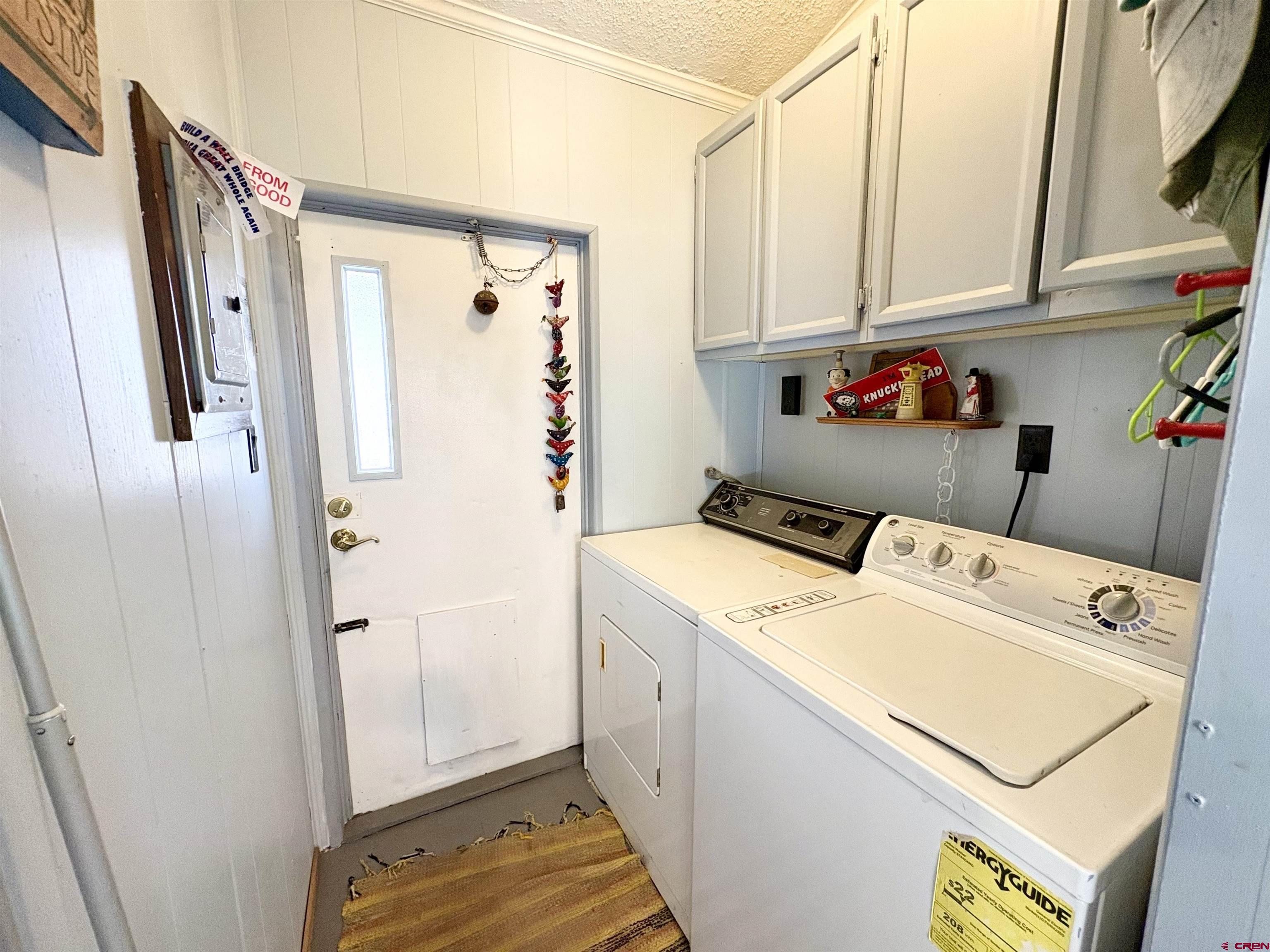 3 Lomas Drive Durango, CO 81301 - Photo 20 of 26 a utility room with dryer and washer