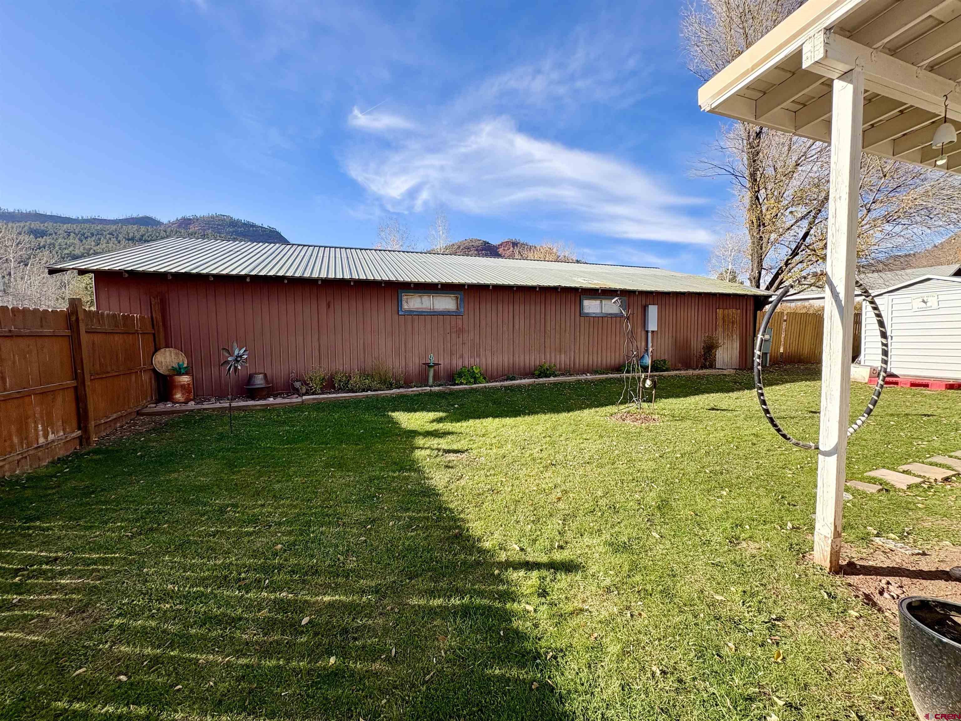 3 Lomas Drive Durango, CO 81301 - Photo 21 of 26 a backyard of a house with lots of green space